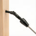Black 0 to 180 degree adjustable cable railing terminal installed on wood stairs