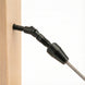 Black 0 to 180 degree adjustable cable railing terminal installed on wood stairs