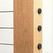 Exterior view of sleek black cable railing end caps sitting flush on a wood post