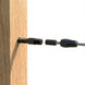 Black invisible swage terminal hidden completely inside a wood post