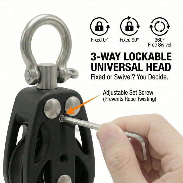 Close-up of hands securing a pin into a heavy-duty black swivel pulley block, demonstrating the setup of industrial-grade rigging hardware.