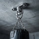 RiaYer heavy duty ceiling hook mounting a punching bag to a concrete ceiling.