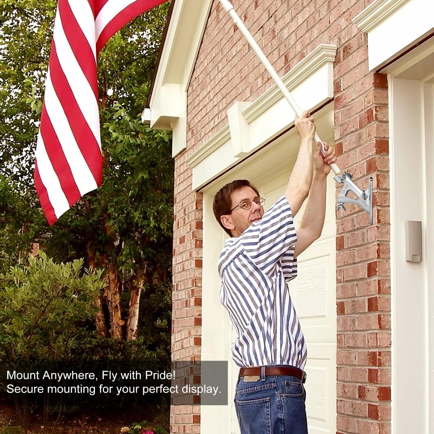 Woman displaying flag using wall mount flagpole bracket on house porch