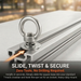 Close-up of a stainless steel tie-down anchor ring installed in a metal L-track system, with text highlighting the easy "Slide, Twist & Secure" installation method.