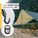 Action shot showing a heavy-duty black stainless steel hook and eye turnbuckle securely anchoring an outdoor sun shade sail or camping tarp.