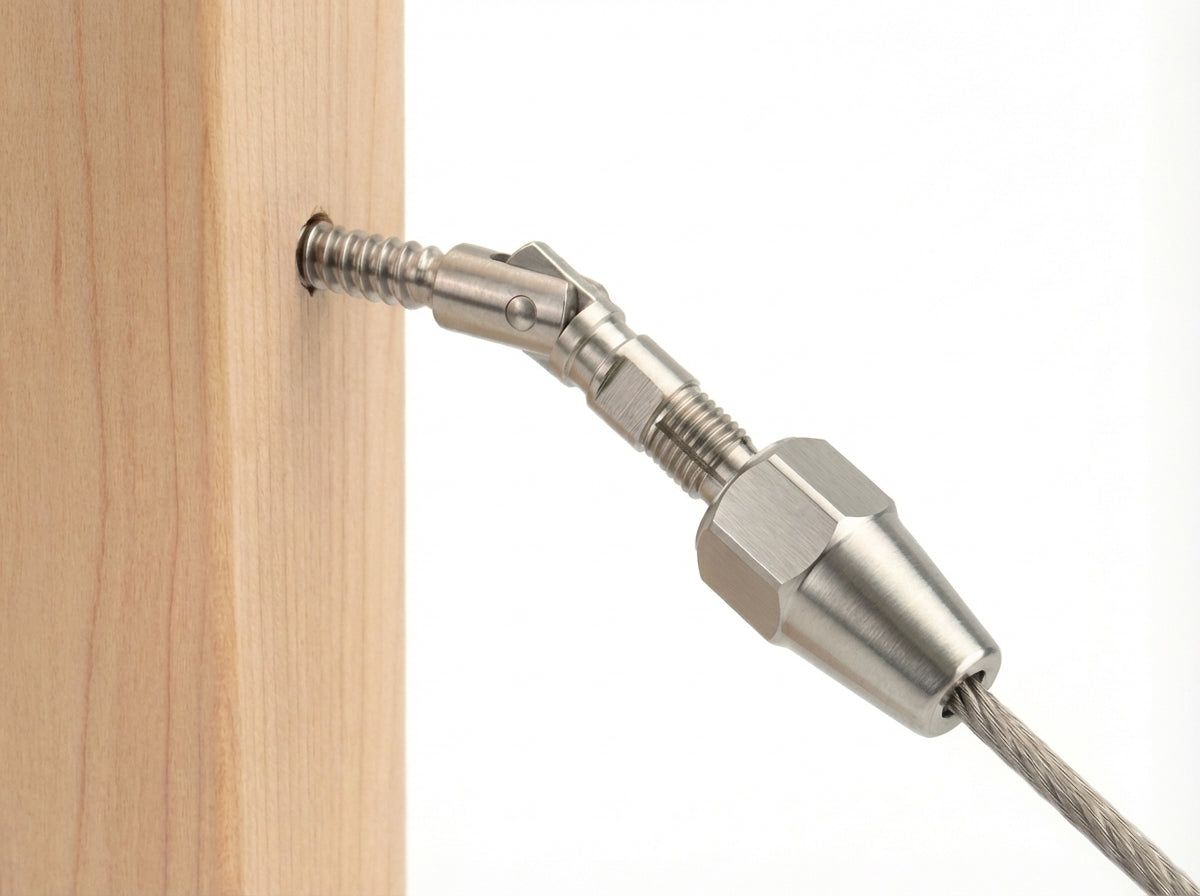 Silver 0 to 180 degree adjustable cable railing terminal installed on wood stairs