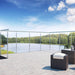 Beautiful outdoor deck with lake view using silver invisible cable railing hardware